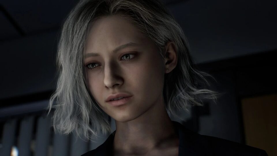 Gros plan sur le visage de Grace Ashcroft, l’héroïne de Resident Evil Requiem, dans la pénombre
